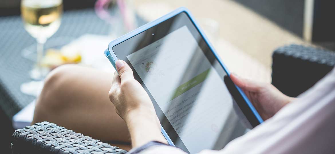 Person Holding Tablet
